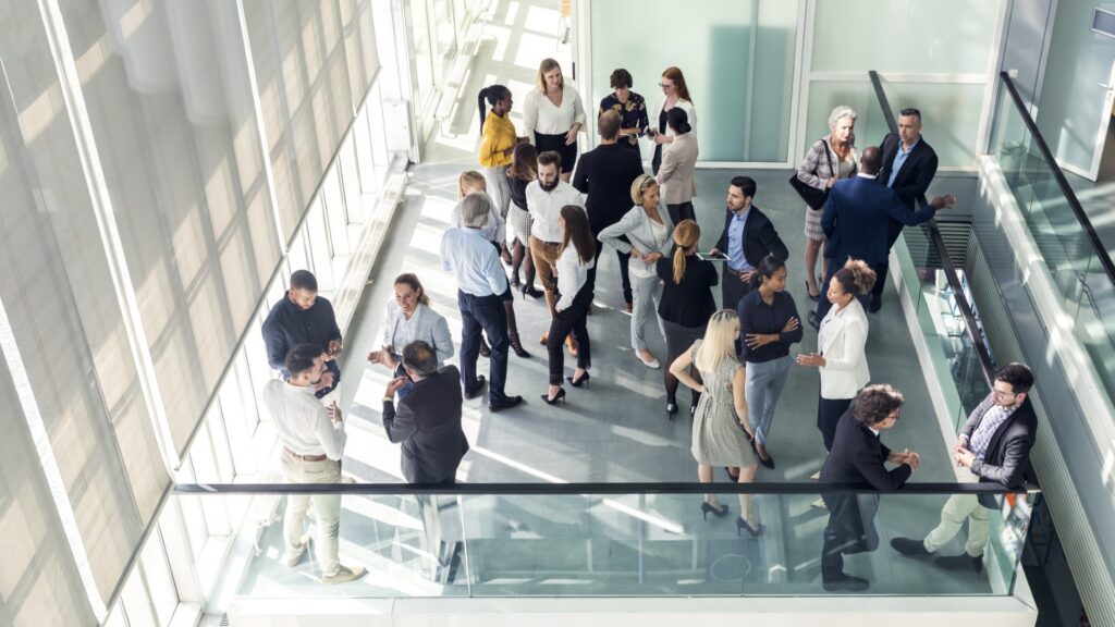A gathering of people in an office environment